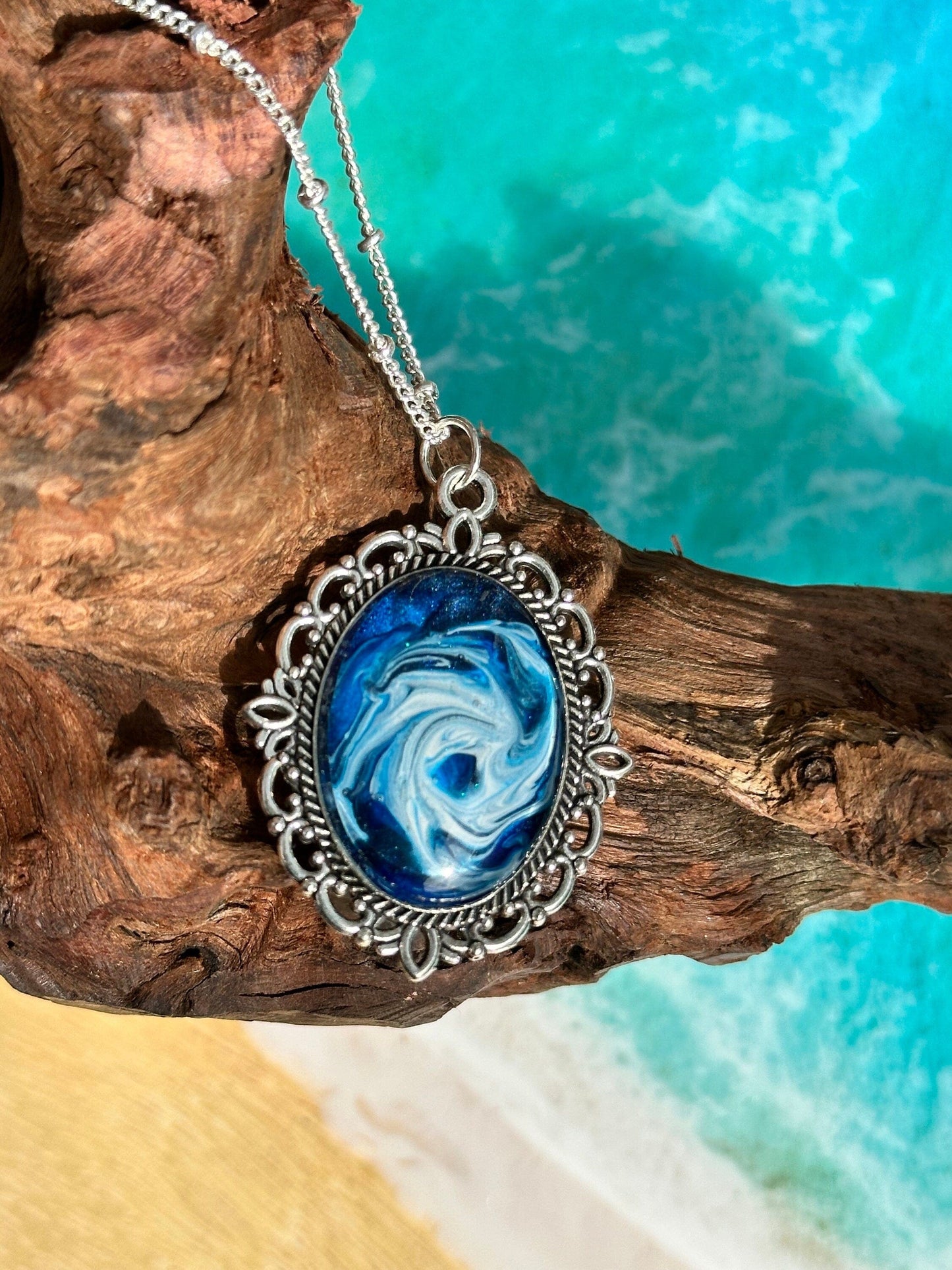 Basic Beaches Collective Resin Ocean Hurricane Pendant Necklace Resin Ocean Hurricane Pendant Necklace