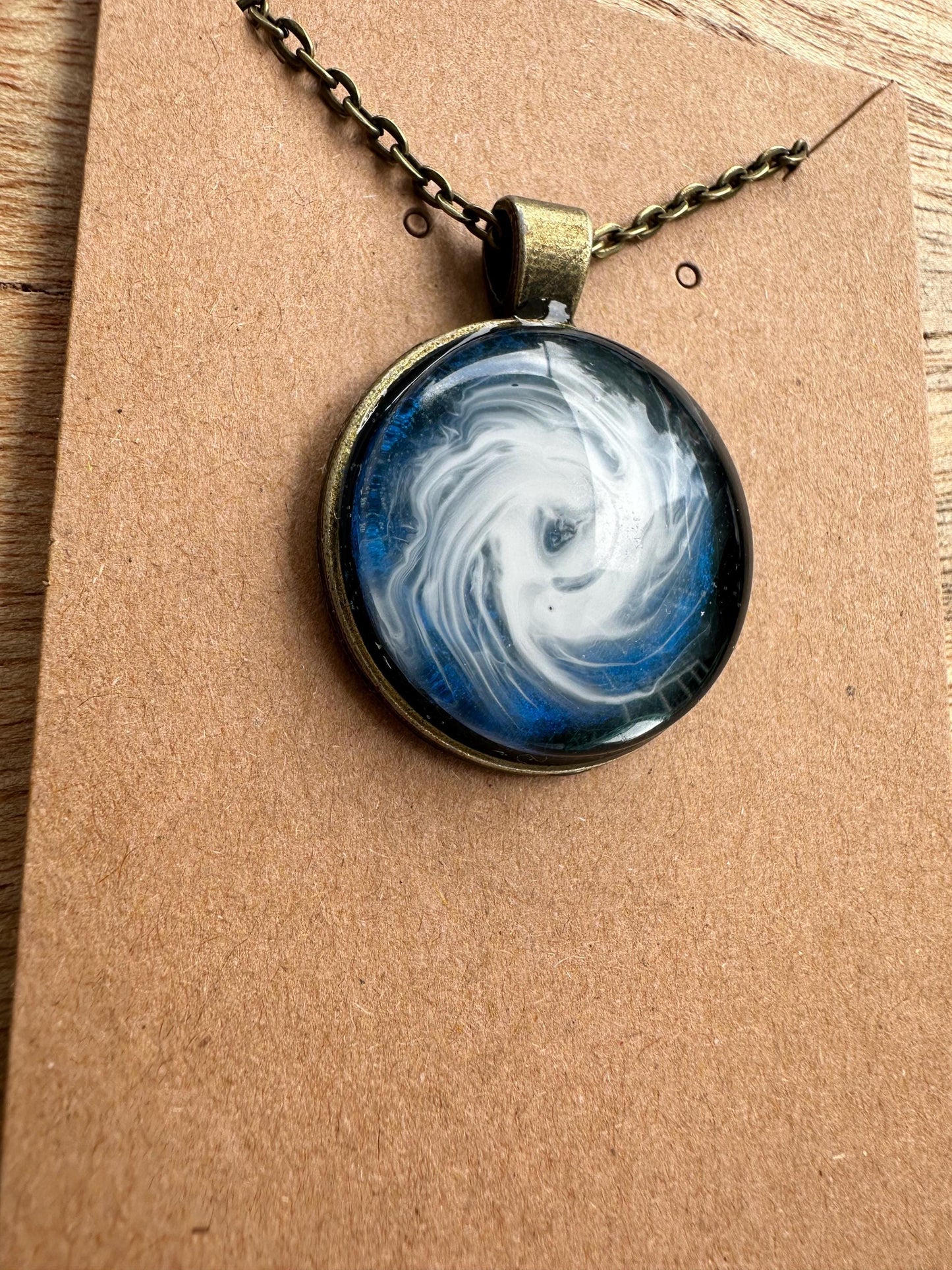 Basic Beaches Collective Resin Ocean Hurricane Pendant Necklace Resin Ocean Hurricane Pendant Necklace