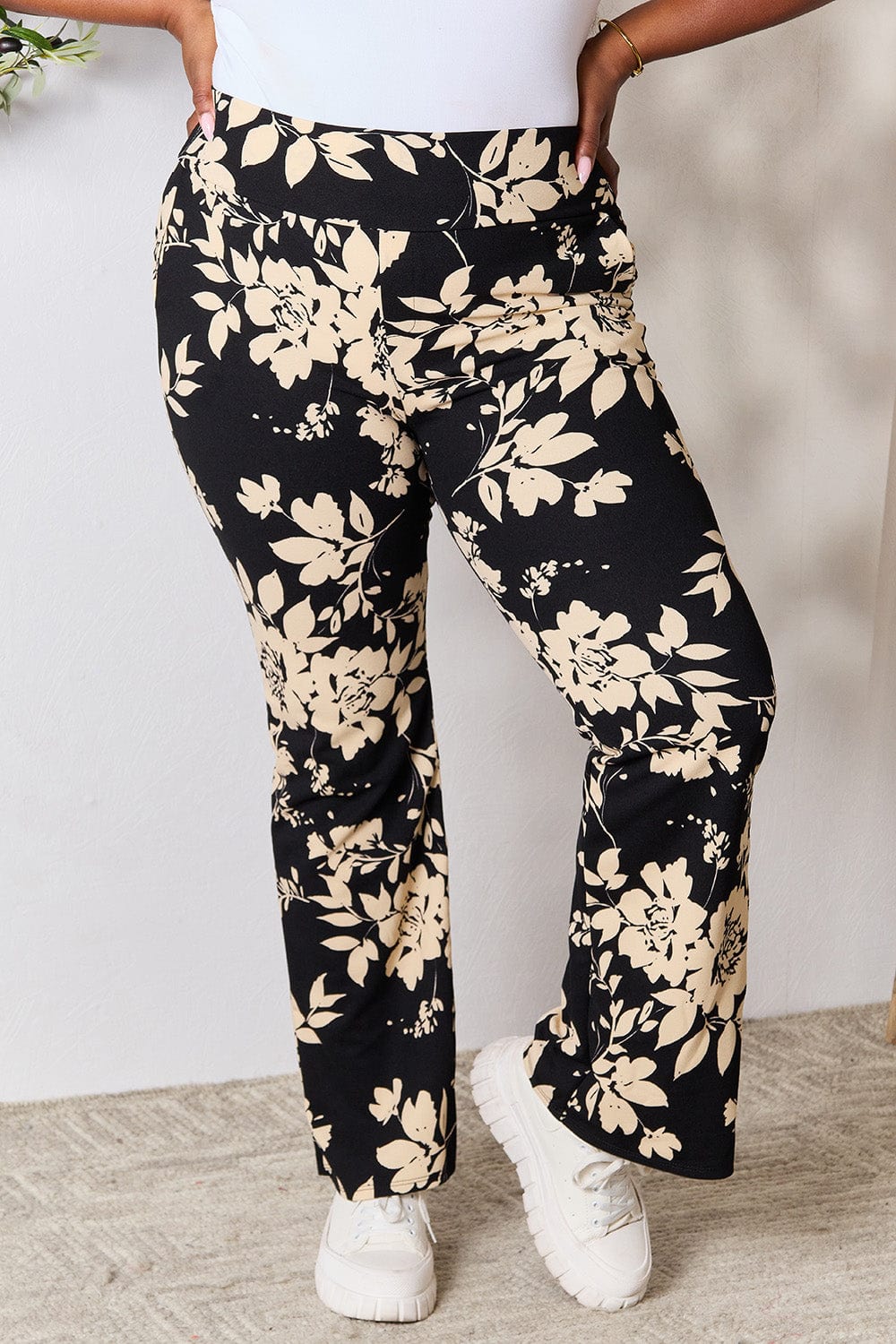 Trendsi Black/Taupe / S Heimish Full Size High Waist Floral Flare Pants Heimish Full Size High Waist Floral Flare Pants
