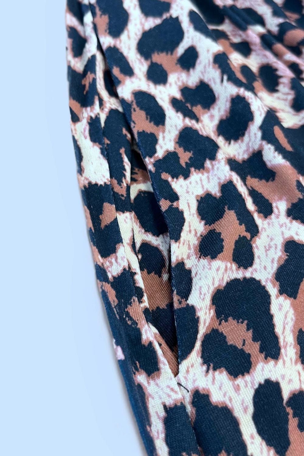 Trendsi Double Take Printed Scoop Neck Sleeveless Buttoned Magic Dress with Pockets Double Take Printed Scoop Neck Sleeveless Buttoned Magic Dress with Pockets