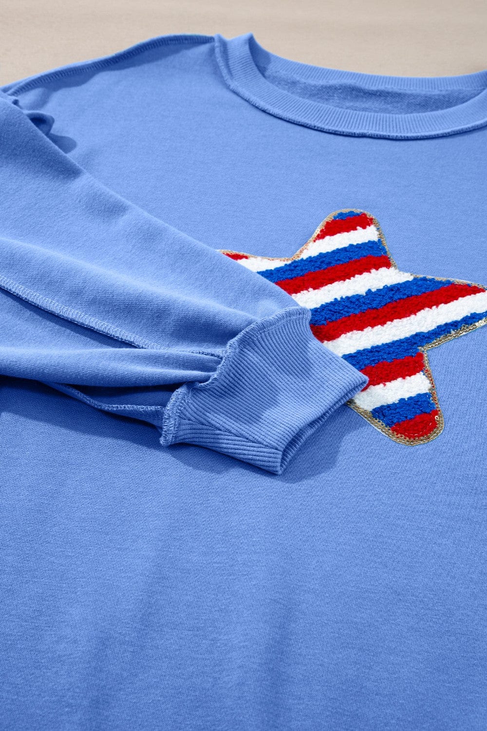 Trendsi Fall Exposed Seam Star Long Sleeve Sweatshirt Exposed Seam Star Long Sleeve Sweatshirt