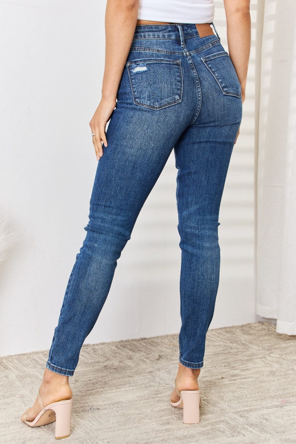 Trendsi Judy Blue Full Size Mid Waist Distressed Slim Jeans Judy Blue Full Size Mid Waist Distressed Slim Jeans