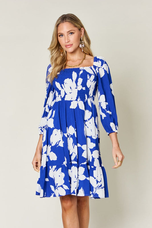 Trendsi Royal Blue / S Double Take Full Size Floral Ruffle Hem Smocked Dress with Pockets Double Take Full Size Floral Ruffle Hem Smocked Dress with Pockets