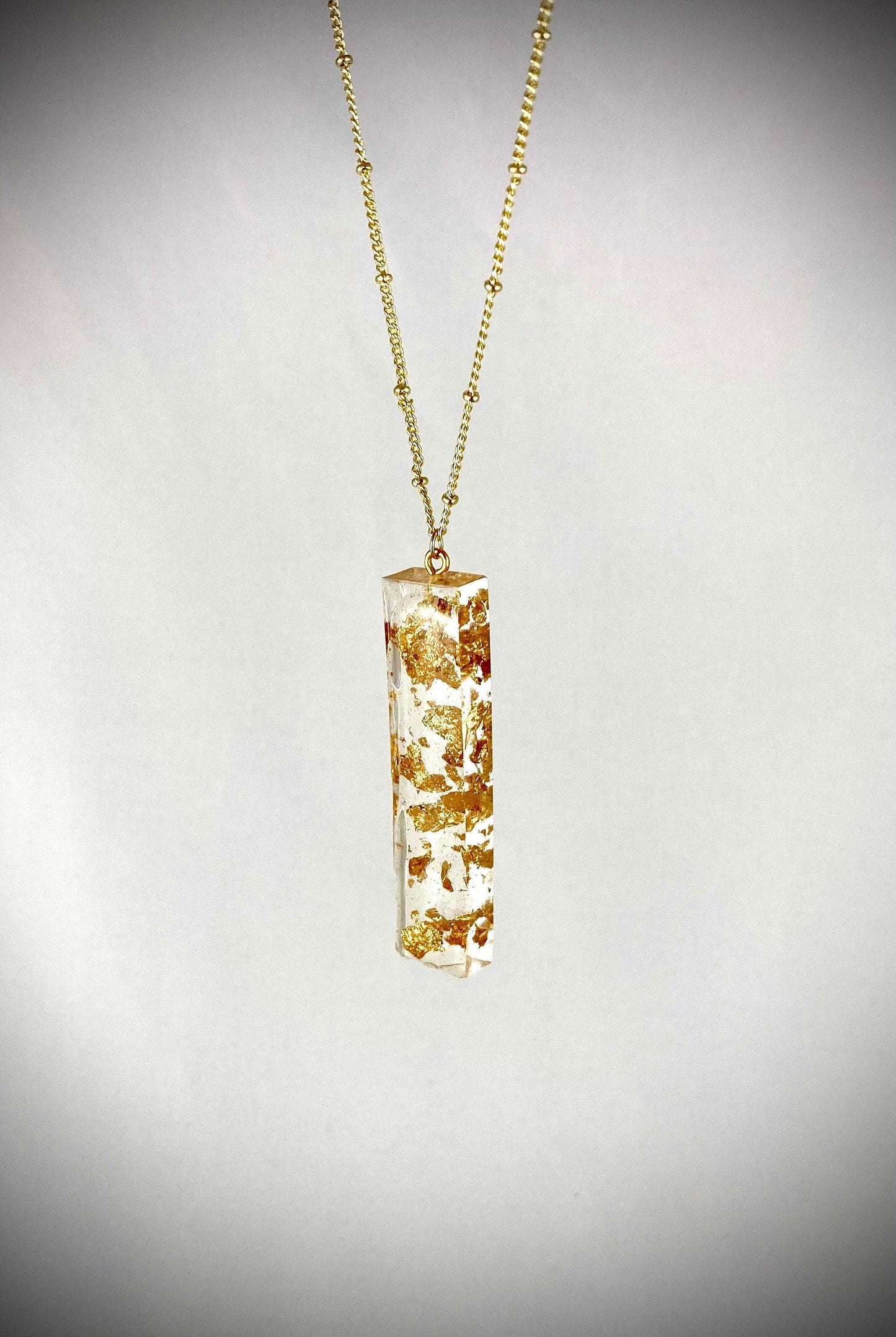 Basic Beaches Collective Resin Pendant Necklace with Gold Leaf Flakes Resin Pendant Necklace with Gold Leaf Flakes