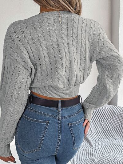 Basic Beaches Collective Twisted Cable-Knit V-Neck Sweater Twisted Cable-Knit V-Neck Sweater
