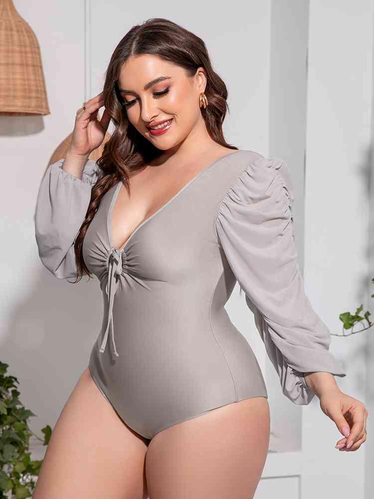 Trendsi Plus Size Tied Deep V Balloon Sleeve One-Piece Swimsuit Plus Size Tied Deep V Balloon Sleeve One-Piece Swimsuit