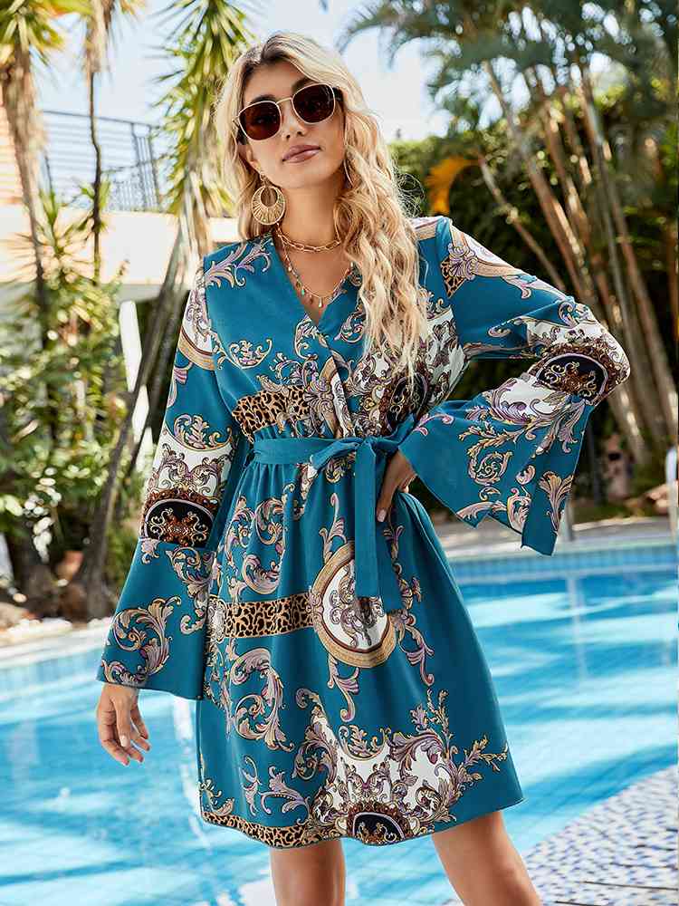Trendsi Printed Tie Belt Slit Flare Sleeve Dress Printed Tie Belt Slit Flare Sleeve Dress